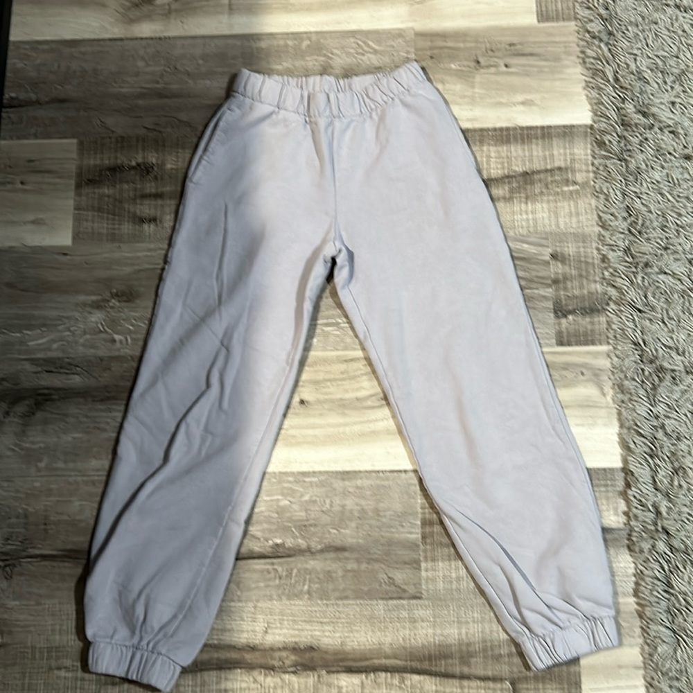 brandy melville sweat pants- light blue- small two holes in front-can be sewed